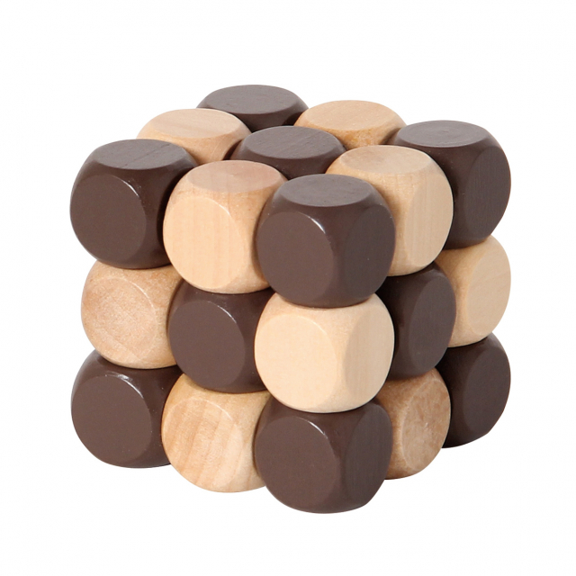 Träpussel i form av en ormkub, hålls i handen för fokus och motorikträning.